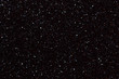 © nikol85 - Blurred shiny black background with sparkling lights.