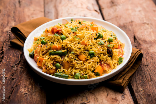 Tawa Pulao/Pulav/Pilaf/Pilau is an Indian Street Food  made using basmati rice, vegetables and spices. Selective focus