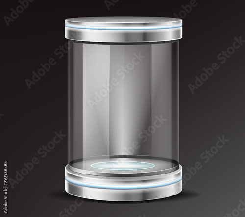 Fotografía Empty glass cylinder capsule, transparent round showcase with neon illumination in metal base, lid