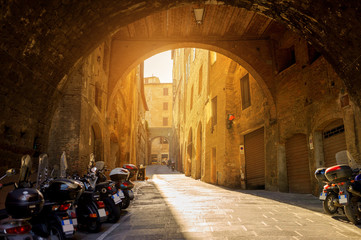 Panorama of an old street in an Italian city at dawn, Siena. Italy