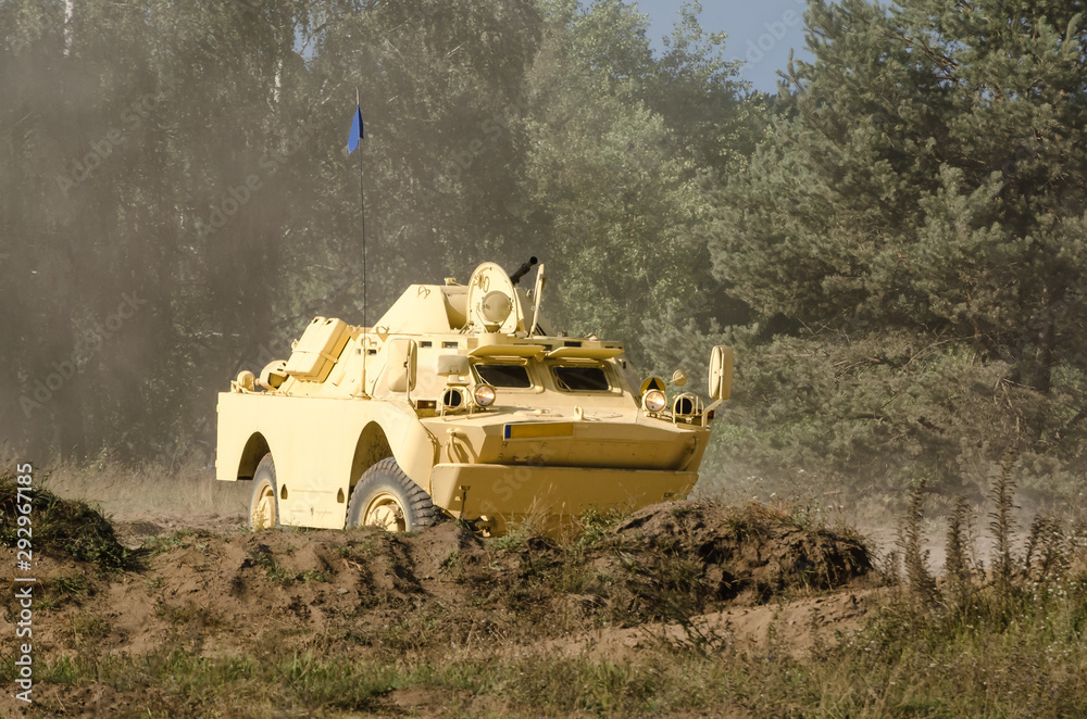 COMBAT RECONNAISSANCE/PATROL VEHICLE - A scout in desert colors at the ...