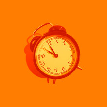 Monochrome Orange Classic Style Alarm Clock Isolated On Background. New Year And Start Up Concept