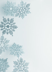 Wall Mural - festive winter background with decorative snowflakes in flying. christmas, winter or new year concep