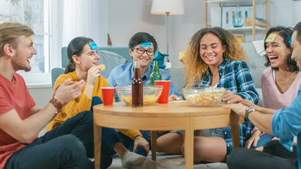 Wall Mural - In the Living Room Diverse Group of Fun Loving Friends Playing 