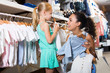 © JackF - Mother with daughter buying clothes