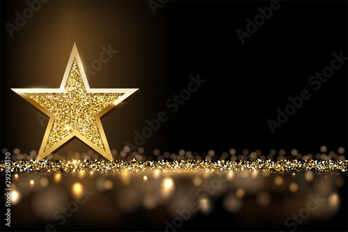 Fotografía Golden sparkling star isolated on dark luxury horizontal background