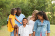 © digitalskillet1 - Portrait of a multi ethnic family laughing.