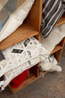 © KCULP - Assorted throw pillows in wooden shelf at store