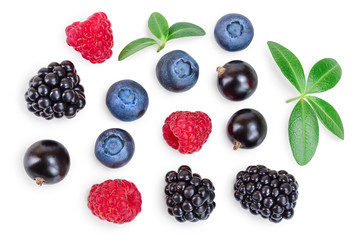 mix of blackberry blueberry raspberry isolated on white background. Top view. Flat lay pattern