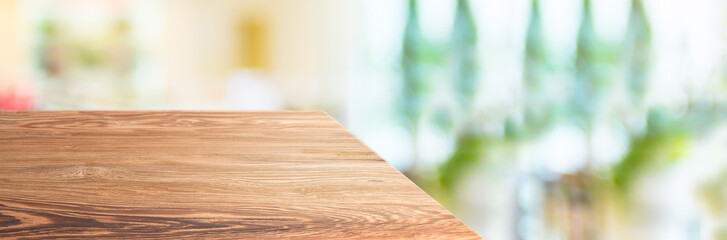 Aufkleber - wood table top product display background with blur people in green cafe restaurant.left perspective wooden kitchen counter.Banner mockup presentation for your product online