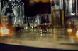 © maeching - Bartender Serve Whiskey, on wood bar,