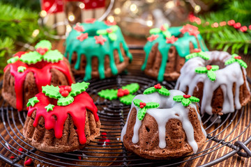 Wall Mural - Christmas Cake with Festive Sugar Decorations on  Christmas Table