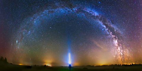 Wall Mural - Panoramic landscape with Milky way galaxy and man silhuette