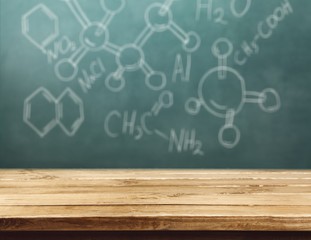 Wall Mural - Molecule models and formulas on blackboard background