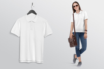 Wall Mural - Hanging t shirt plain white polo t shirt on wall. Beside standing beautiful female model in blue denim jeans pant. 