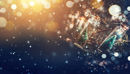 close-up, elegant christmas tree in glass jar with snowflakes background. copy space.