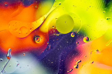 Poster - Abstract rainbow color backdrop with oil drops and waves on water surface. 3d render illustration