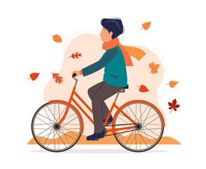 Wall Mural - Man with a bike in autumn. Vector illustration in flat style