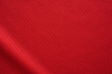 Red sports clothing fabric football jersey texture close up