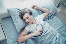 Top High Above Angle Photo Of Overworked Blonde Haired Man Lying On Bed Sleep Ignore Alarm Clock Ring Bell Missed First Class In College Stay In House Indoors