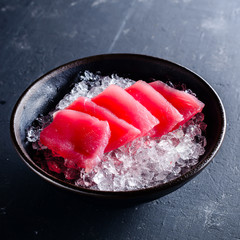 Wall Mural - Japanese foods sashimi, Fresh raw sliced fish on black plate, Traditional Japanese food menu