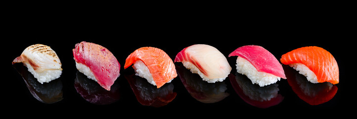 Sticker - sushi set nigiri on a black background