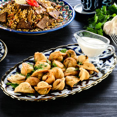 Sticker - Oriental Fried duchansky chuchvara Dumplings with Minced Meat also known as Gyoza. Close Up. Hot Crunchy Deep-Fried Beef and Mutton Pelmeni