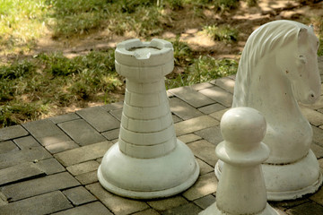 Big chess pieces in the park.