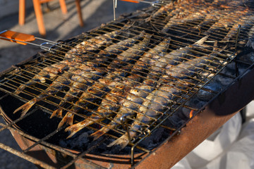 Wall Mural - Herring on a grill on the market