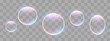 Realistic soap bubbles with rainbow reflection set isolated. 