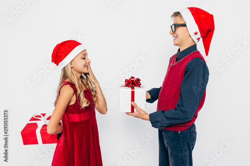Sister giving brother gift