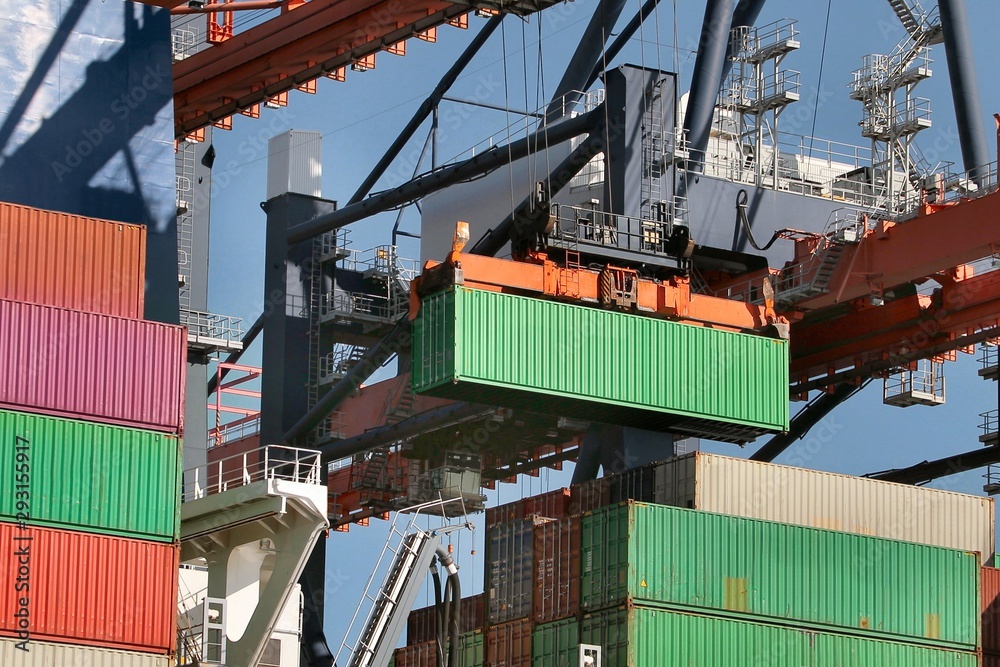 Cargo containers loaded on a huge ship in an intermodal freight ...