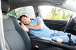 © Syda Productions - transport, rest and driving concept - tired man or driver sleeping in car