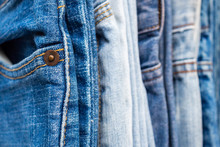 Denim Blue Jeans Stack Texture Background Closeup