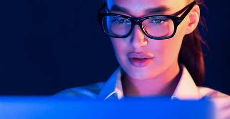 Canvas Print - Overwork. Woman working on laptop at night