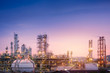© weerapong - Oil and gas refinery plant or petrochemical industry on sky sunset background, Factory with evening, Gas storage sphere tank in petrochemical industrial