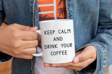 Wall Mural - Inspirational quote on coffee mug - Keep calm and drink your coffee.