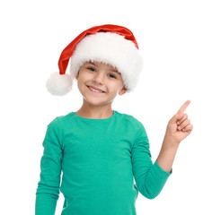 Sticker - Cute little child wearing Santa hat on white background. Christmas holiday