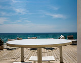 Fototapeta Do akwarium - White wooden table of free space for your decoration and summer bar in resort. 