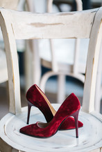 Women's Shoes On The Chair. Women's Shoes With Heels In Various Colors