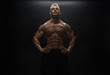 © bondarchik - Fitness model man posing in studio