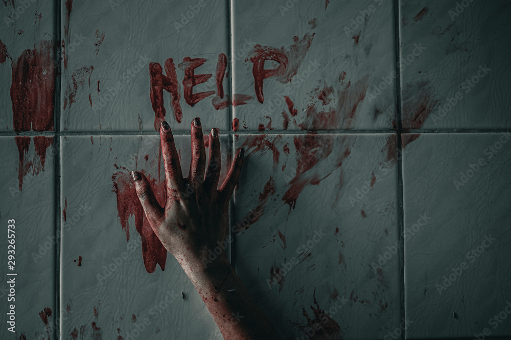 Horror woman write a message requesting help with blood in hand, Halloween murder concept. - obrazy, fototapety, plakaty 
