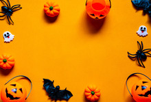 Halloween Holiday Concept, Spooky Pumpkin Bucket, Black Spider, Bats And Tiny Ghost In Orange Background With Copy Space For Text, Top Flat View Wallpaper