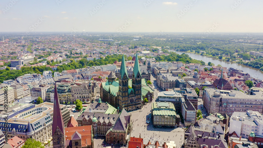 Bremen, Germany. The historic part of Bremen, the old town. Bremen Cathedral ( St. Petri Dom Bremen ). View in flight, Aerial View - obrazy, fototapety, plakaty 