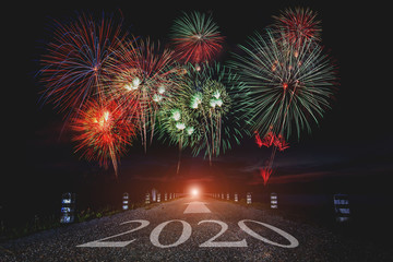 The Path to the Year 2020. Happy New Year with a fireworks celebration background.