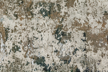 Wall Mural - Texture of messy old cracked stone or cement wall in the sunlight for pattern, background. Cracked concrete wall as background. Selective focus old cracked stucco