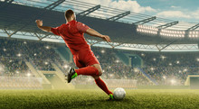 Soccer Player In Action. Run With A Ball. Soccer Stadium With Cheering Fans