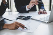 © Freedomz - Business team investment working with computer and analysis graph stock market trading with stock chart data, business and technology concept
