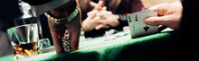 Panoramic Shot Of Man Touching Playing Cards And Poker Chips Near Player