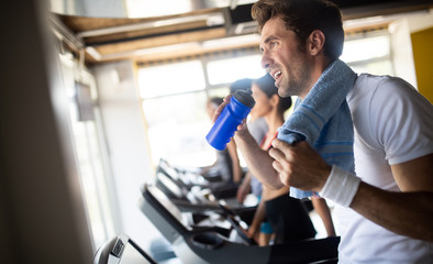 Group of multiethnic sports people make sport exercise in gym